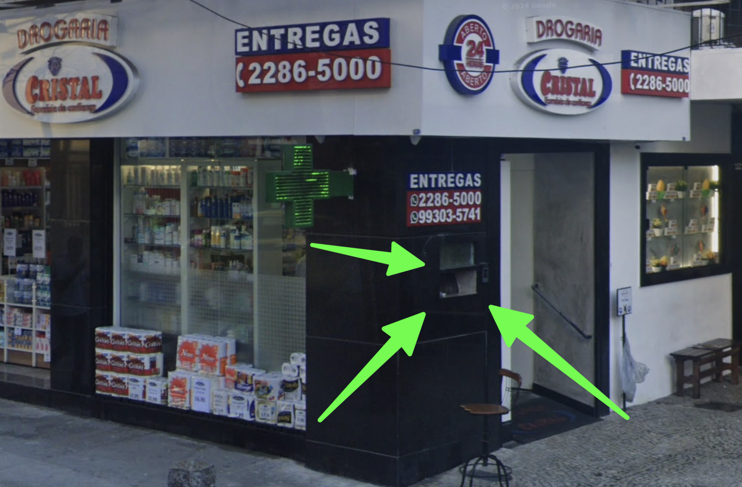 The actual drugstore with arrows pointing to the little window.